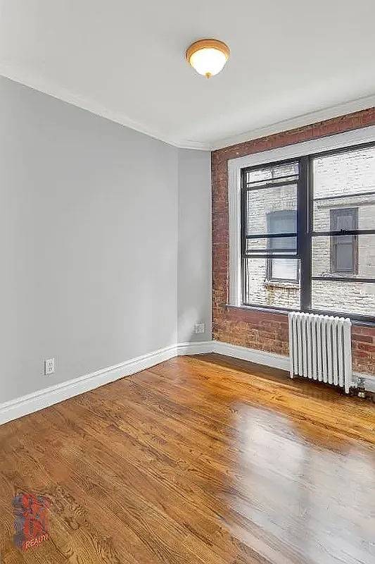 Beautiful newly renovated East Village 1 bedroom apartment with a balcony, in unit washer dryer, granite kitchen with stainless steel appliances, marble bathroom, exposed brick amp ; hardwood floors.