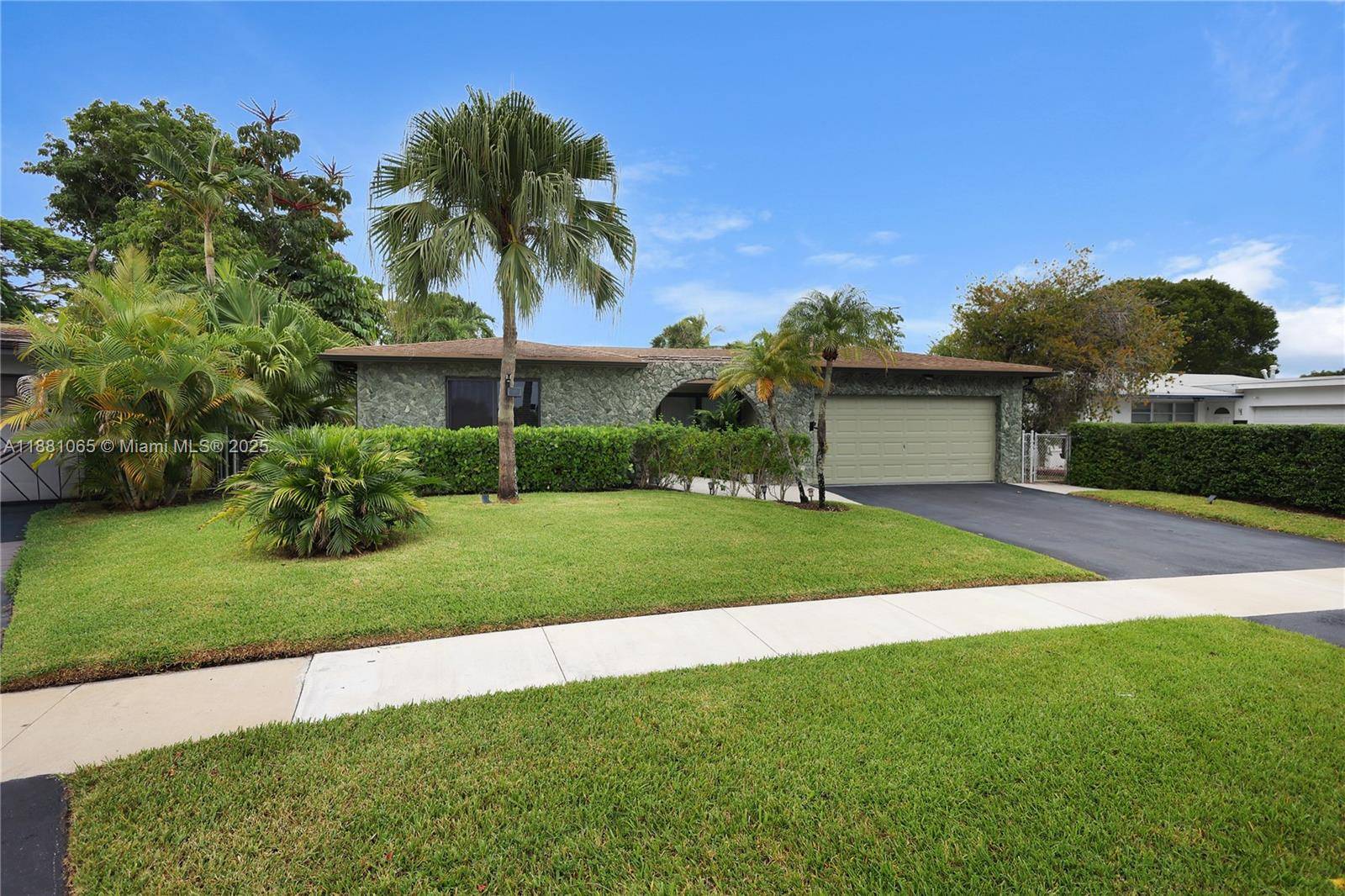 Impeccably maintained 3 bedroom 2 bathroom home seated on an oversized 8, 181 sq.