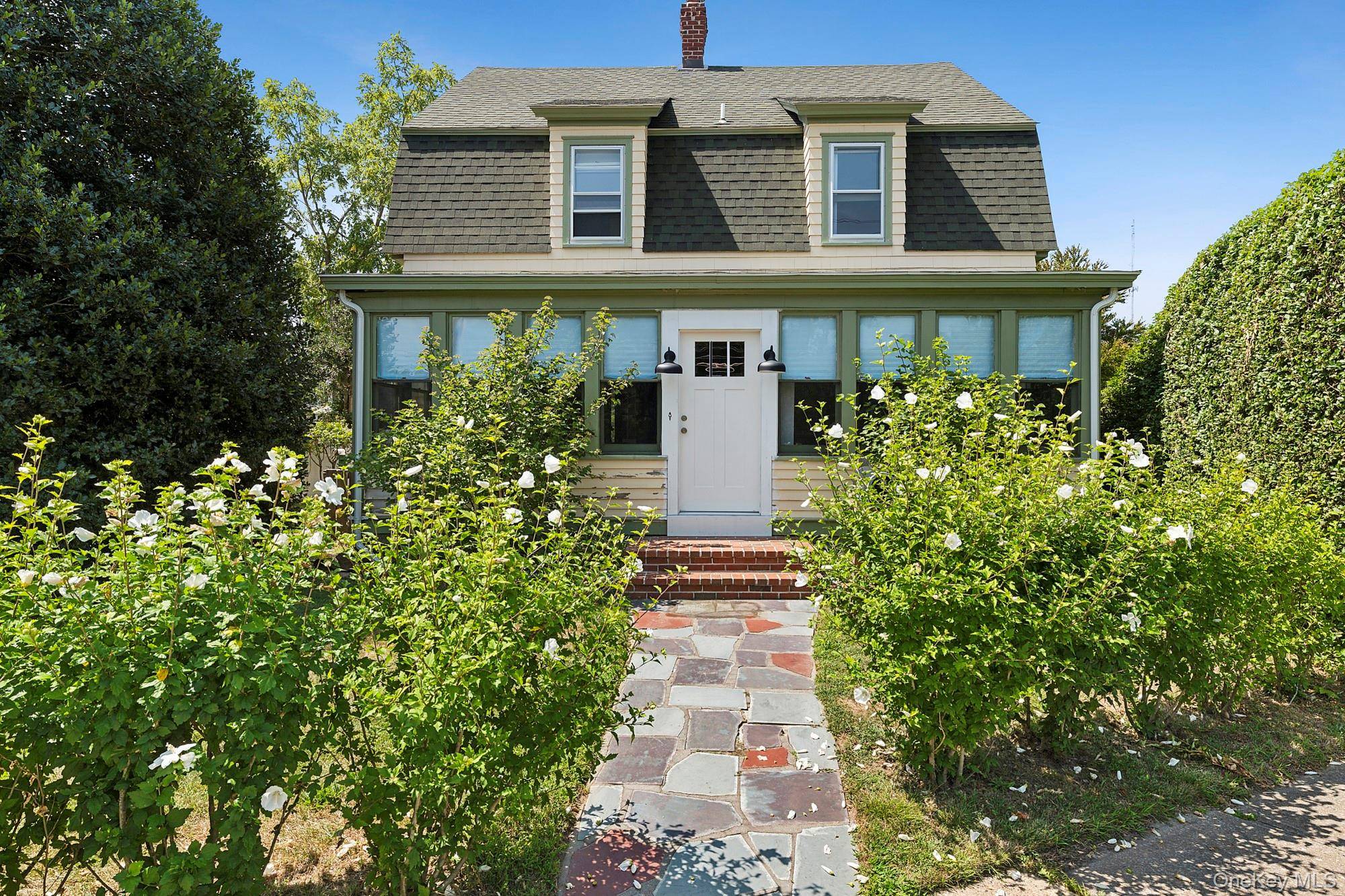 Own a Rare Piece of Greenport s Main Street History Step into The Hommel House, a 3 bedroom cherished Greenport landmark built in 1903.