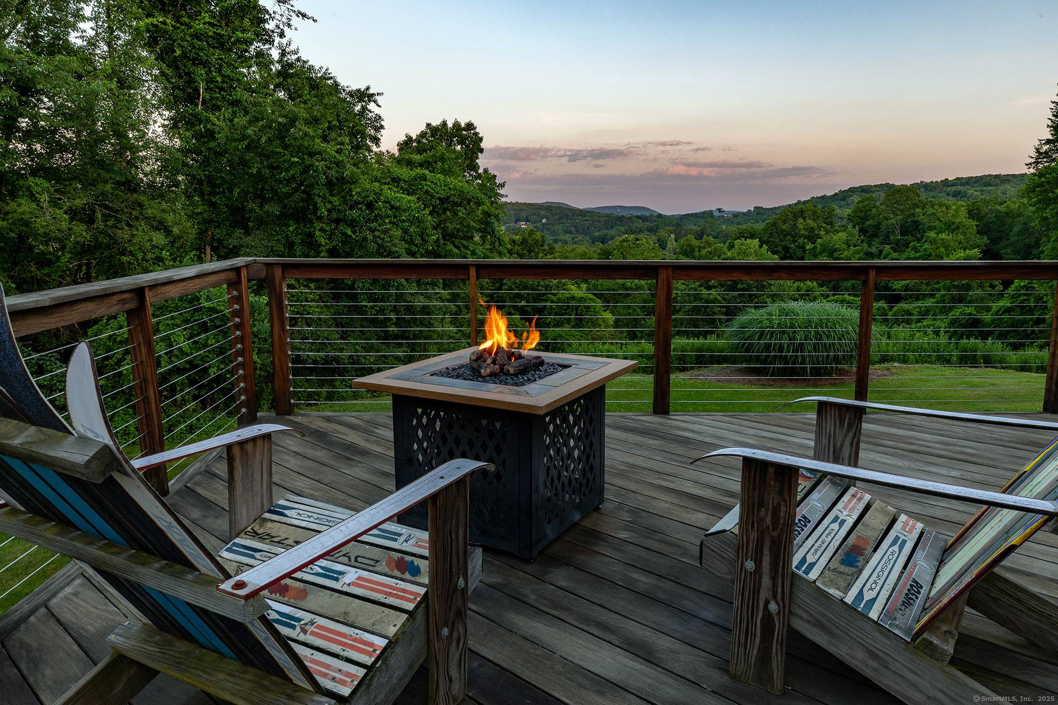 Experience the epitome of modern luxury in this expansive contemporary home with captivating long range southerly VIEWS !