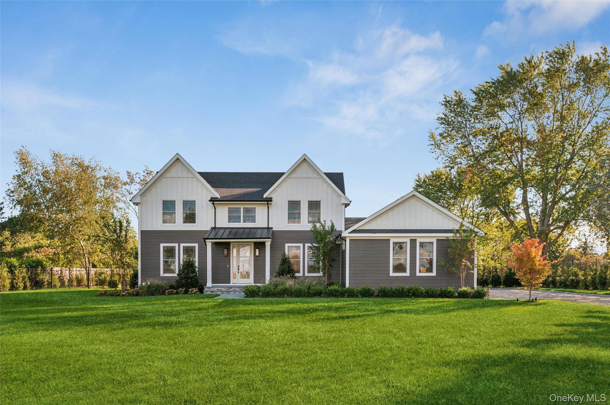 Set against the backdrop of the stunning North Fork, this brand new luxury home in Cutchogue offers the perfect mix of sophisticated design and laid back coastal living.