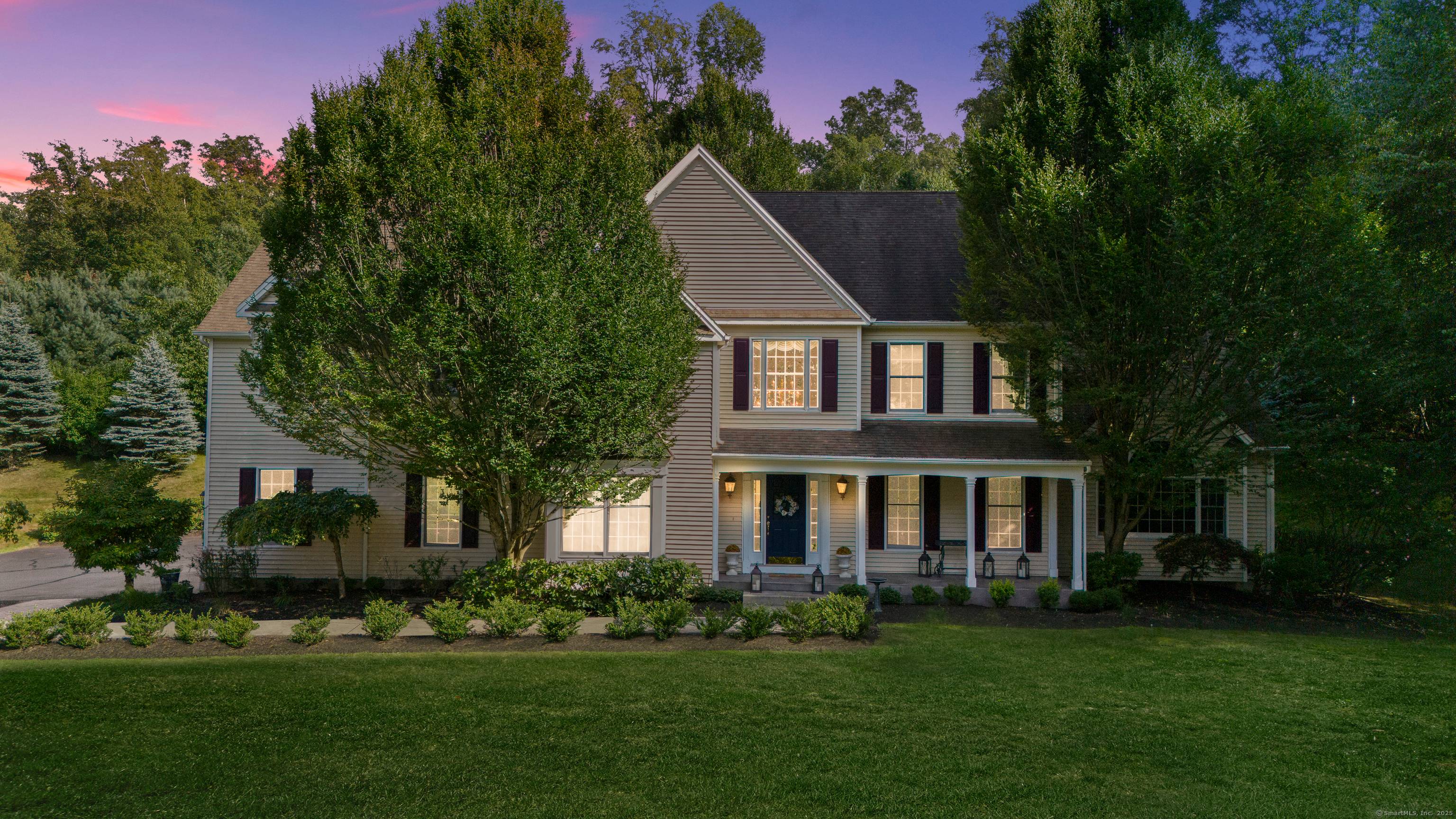Stately Colonial offering timeless elegance and modern comfort, beautifully situated to capture sweeping views.