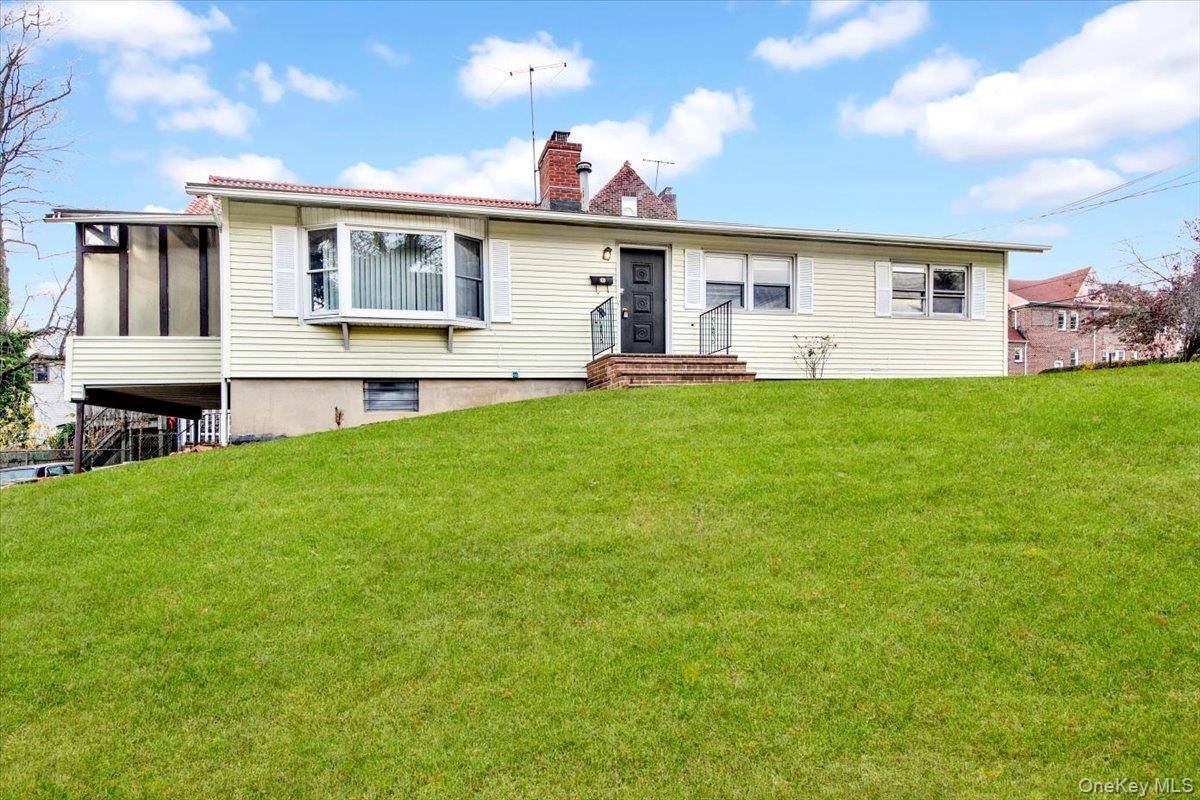 Welcome to 400 Egmont Avenue, a charming ranch style residence nestled on an elevated lot in the heart of Mount Vernon.