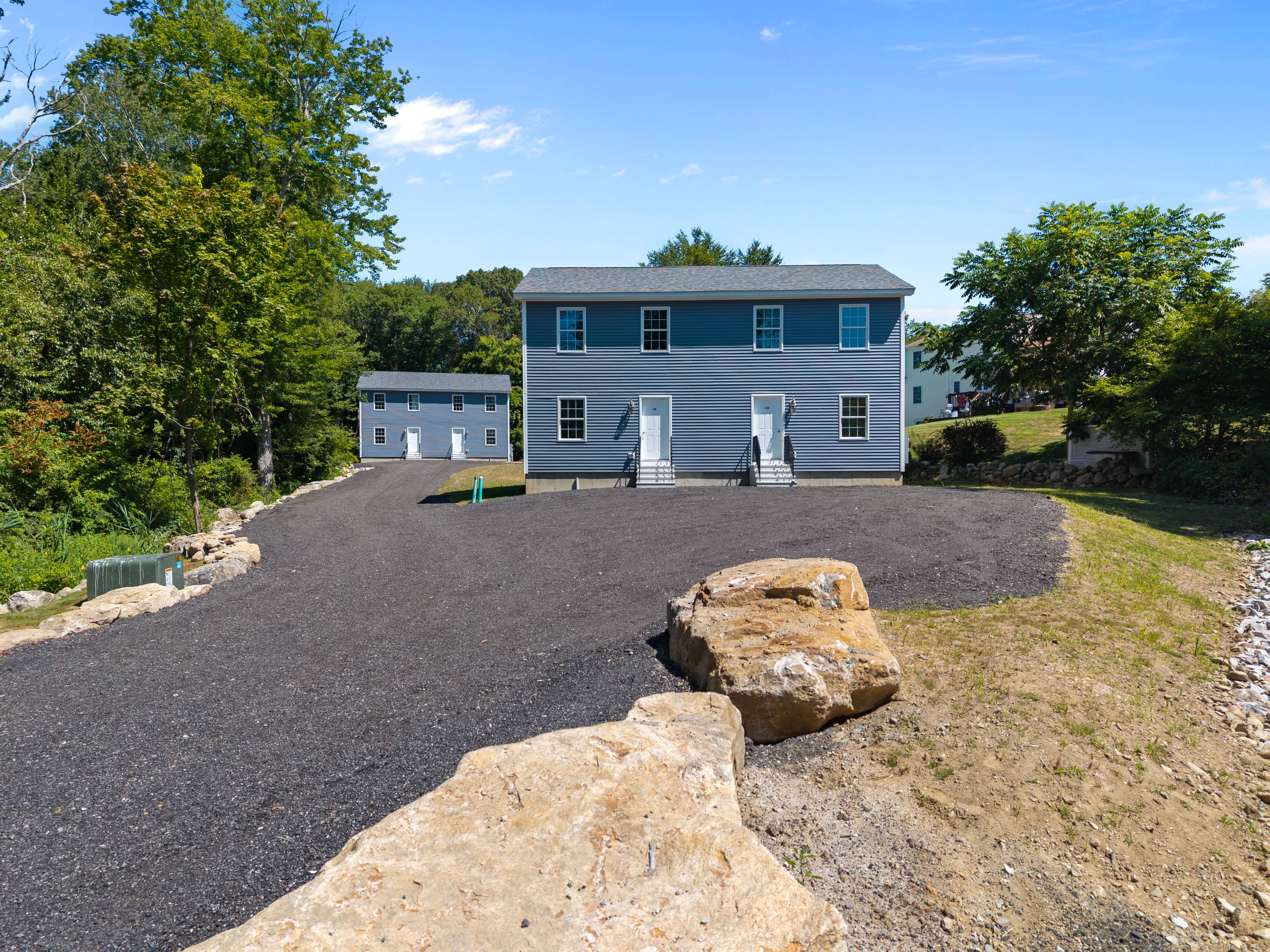 Be the first to own this brand new side by side duplex in the heart of Groton, set back from the road in a private setting !