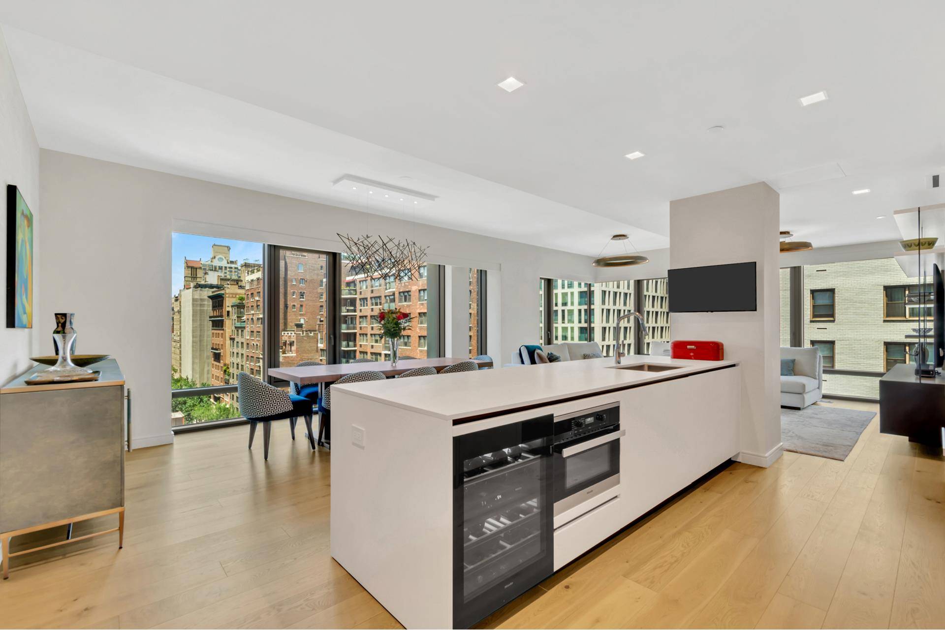 Welcome to Residence 12C at 200 East 21st Street, a bright, meticulously customized 1, 823 square foot corner home offering 3 bedrooms and 3.