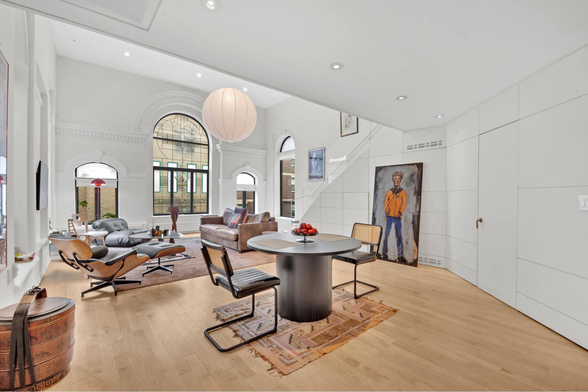 This spectacular triplex penthouse delivers a sense of scale and serenity rarely found in Manhattan.