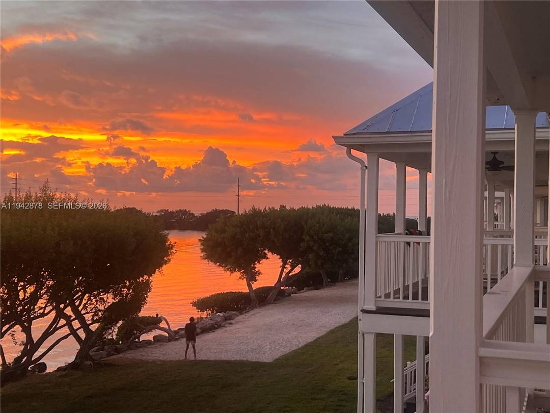 End unit villa in Sunset Village at Hawks Cay Resort, with breathtaking turquoise water views, sun filled with island light and natural coastal feel.