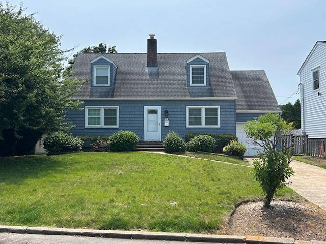 Move right into this 3 bedroom, 2 full bath Cape in Hewlett Woodmere School District 14 home.