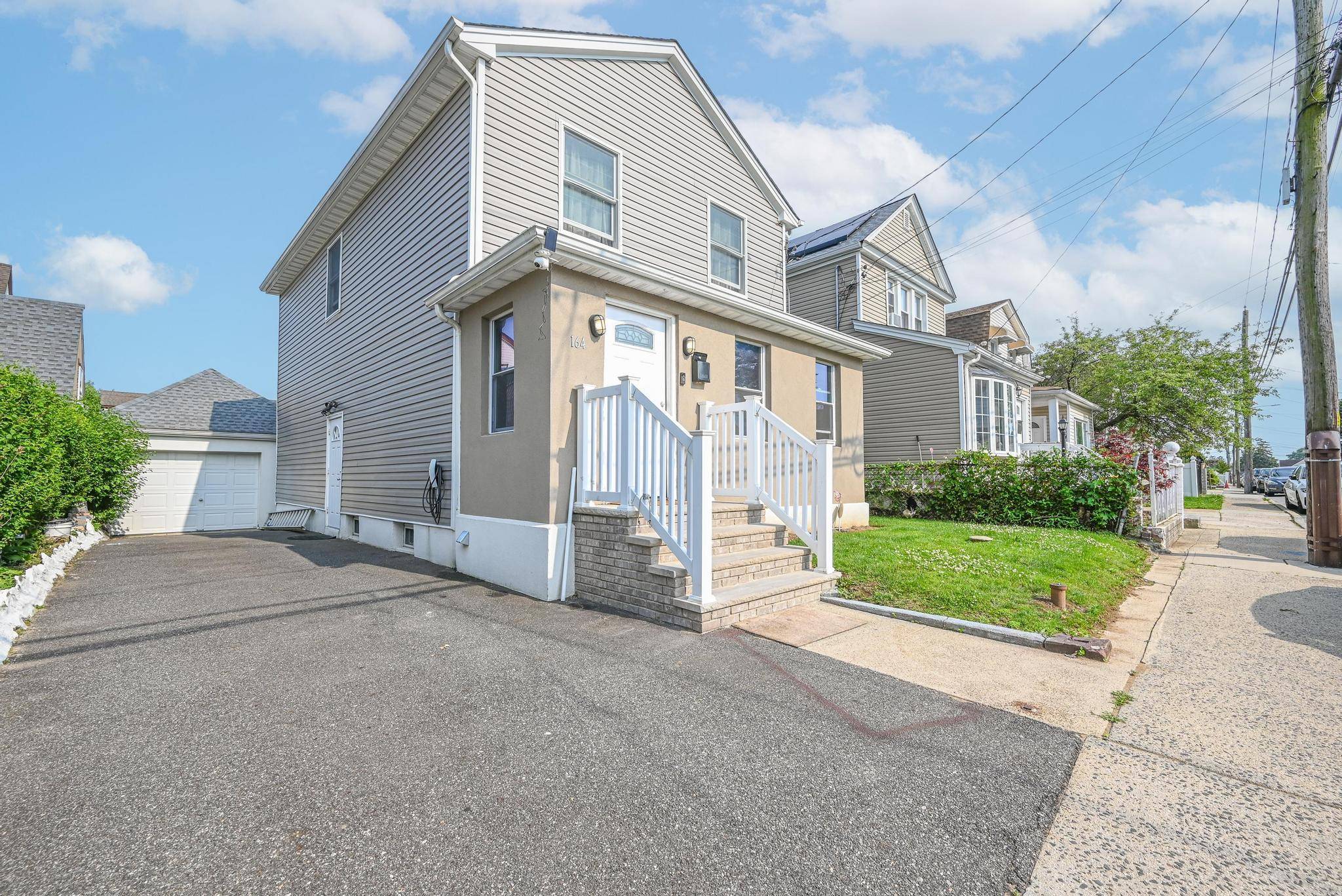 Welcome to this stunning, newly constructed 2019 home in the heart of Elmont !