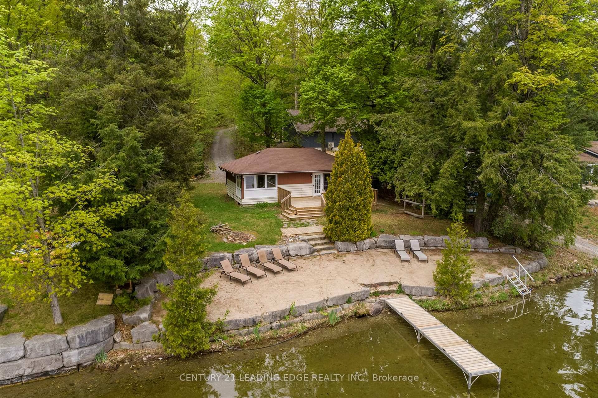 Welcome to this magnificent, 3 season waterfront retreat on White Lake Road West perfect as a family getaway or a lucrative rental property generating approximately 4, 000 per week.