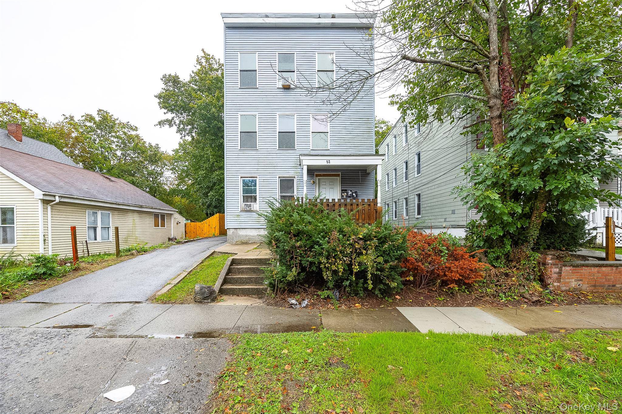 Fully occupied amp ; updated three family comprised of spacious three bedroom units.