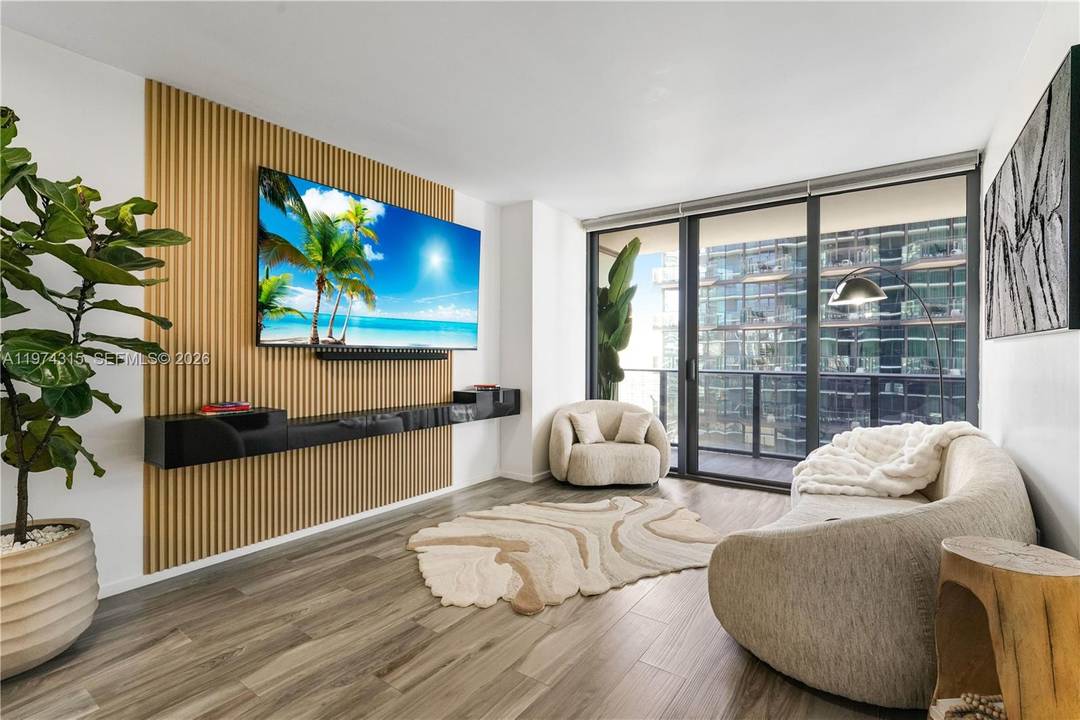 Experience elevated modern luxury in this beautifully redesigned 1 Bedroom Den, 2 Full Bathroom residence at SLS Lux in the heart of Brickell.