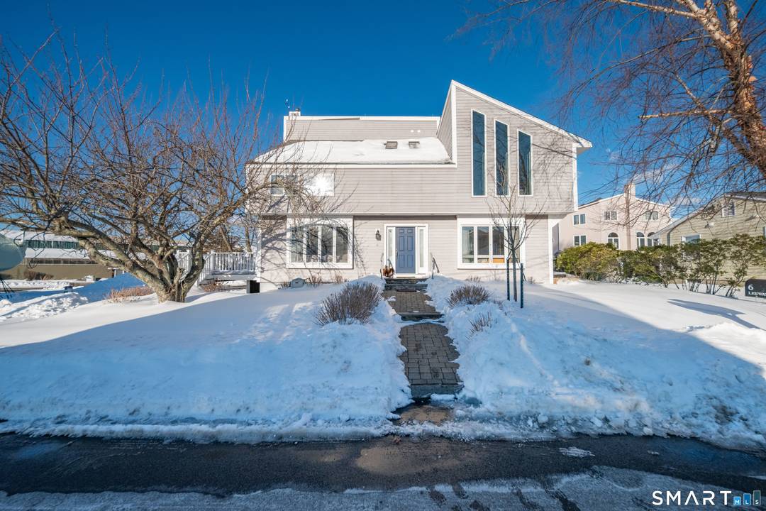 Pristine year round Contemporary home with views of the Marina at Pilots Point.