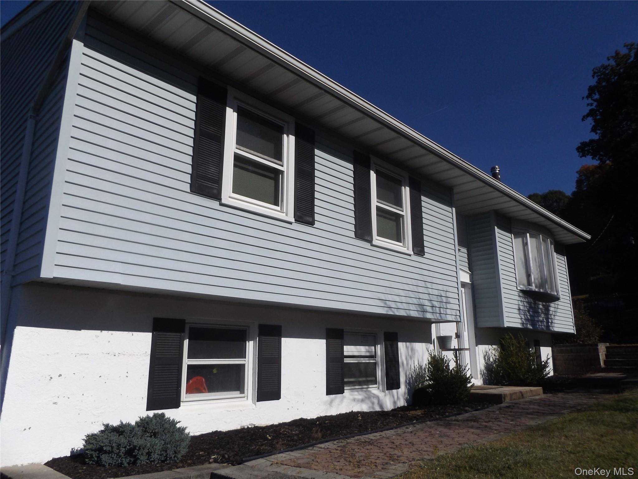 Spacious 3 bedroom 2 bath home with a large fenced in backyard and plenty of parking in Beacon.