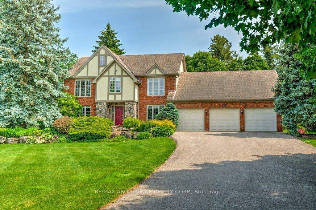 Welcome to 6365 Breckenridge Place your dream country retreat nestled on 2.