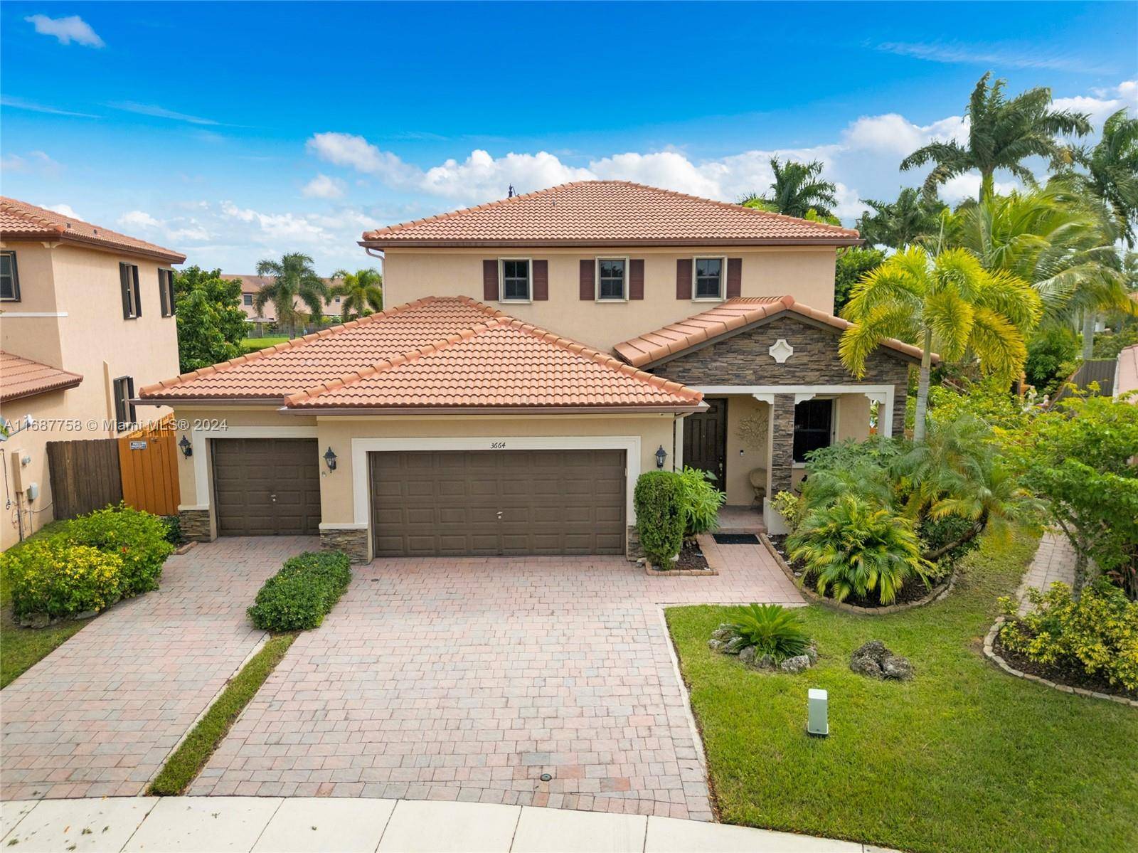 Welcome to a stunning Next Gen home in a prestigious, gated community in Homestead.