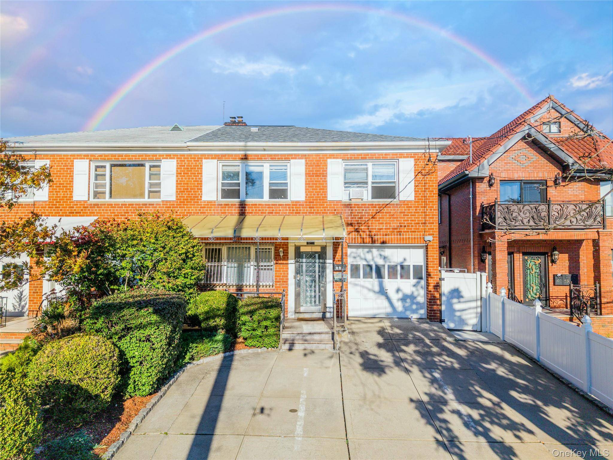 Welcome to this Semi detached brick two family house Located in the heart of down town Flushing !