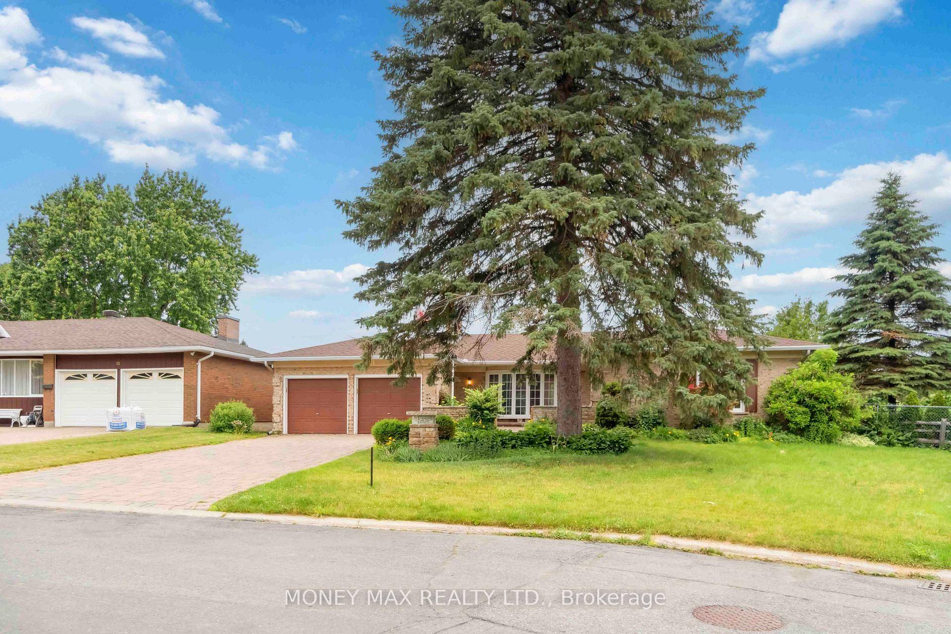 Charming All Brick Bungalow on a Mature, Quiet Street Welcome to this beautiful and spacious all brick bungalow, nestled on a serene and mature street, a perfect blend of comfort, ...