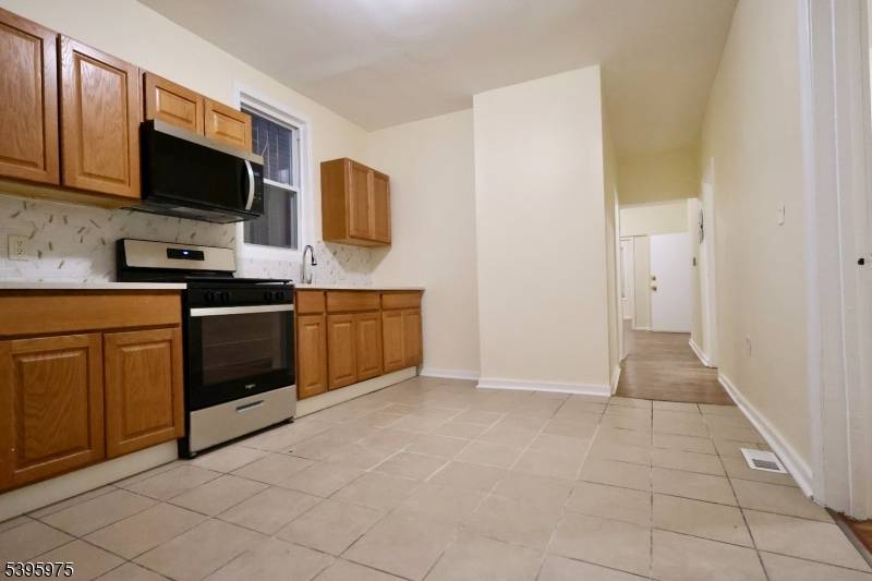 Experience the best of both worlds with this newly renovated 2 family home featuring 8 bedrooms and 3 full baths.