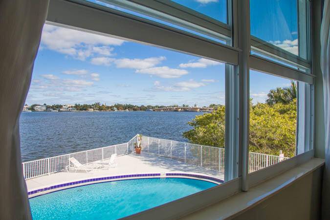 PREMIER DIRECT INTRACOASTAL FRONT property with balcony directly over pool deck.