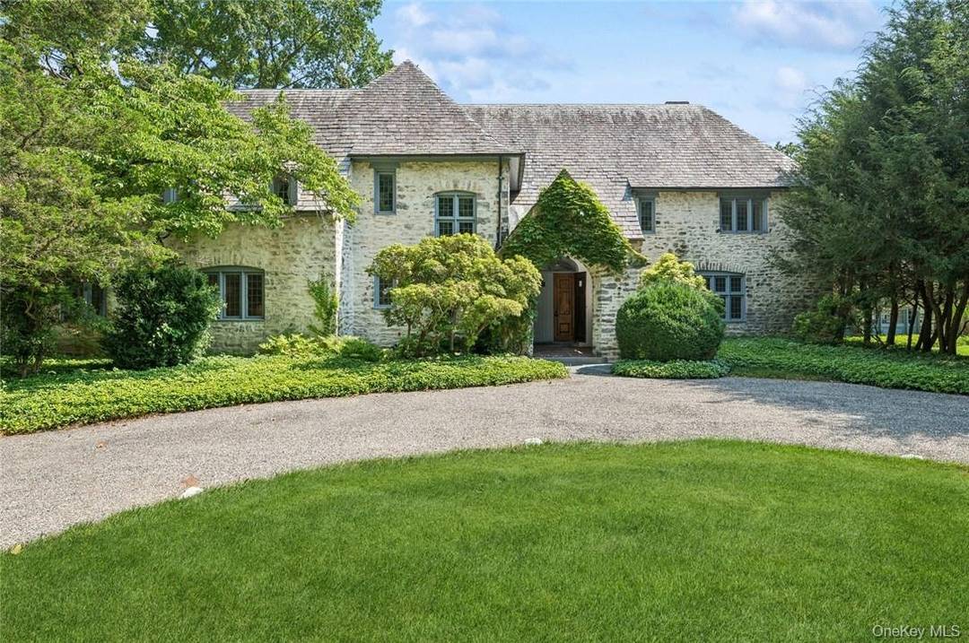 10 ACRES of private property showcases this enchanting 1927 French countryside style estate, a serene retreat nestled just 30 miles outside of New York City.