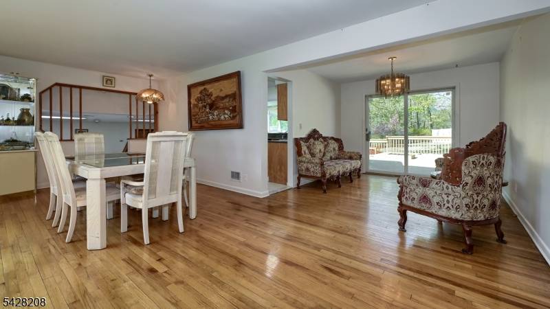 Set on a picturesque 1 acre lot in sought after Park Ridge, this sprawling ranch offers the perfect blend of privacy, comfort, and future potential.