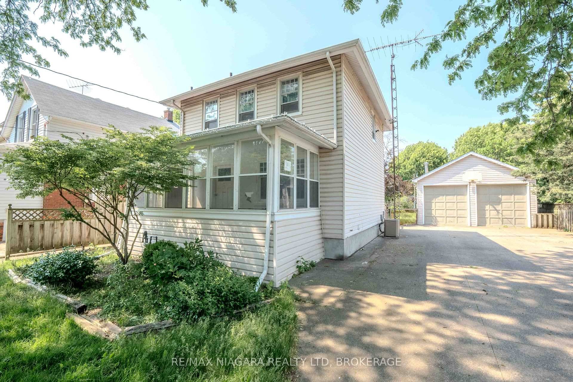 Where else can you find a house in the city with a 22ft x 34ft detached garage, double wide concrete driveway and enough parking for up to 8 vehicles ?