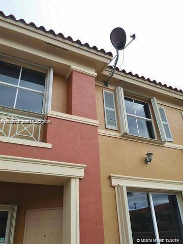 Beautiful 2 Bed 2. 5 Bath townhome located in the highly desirable gated community of The Gates at Doral.