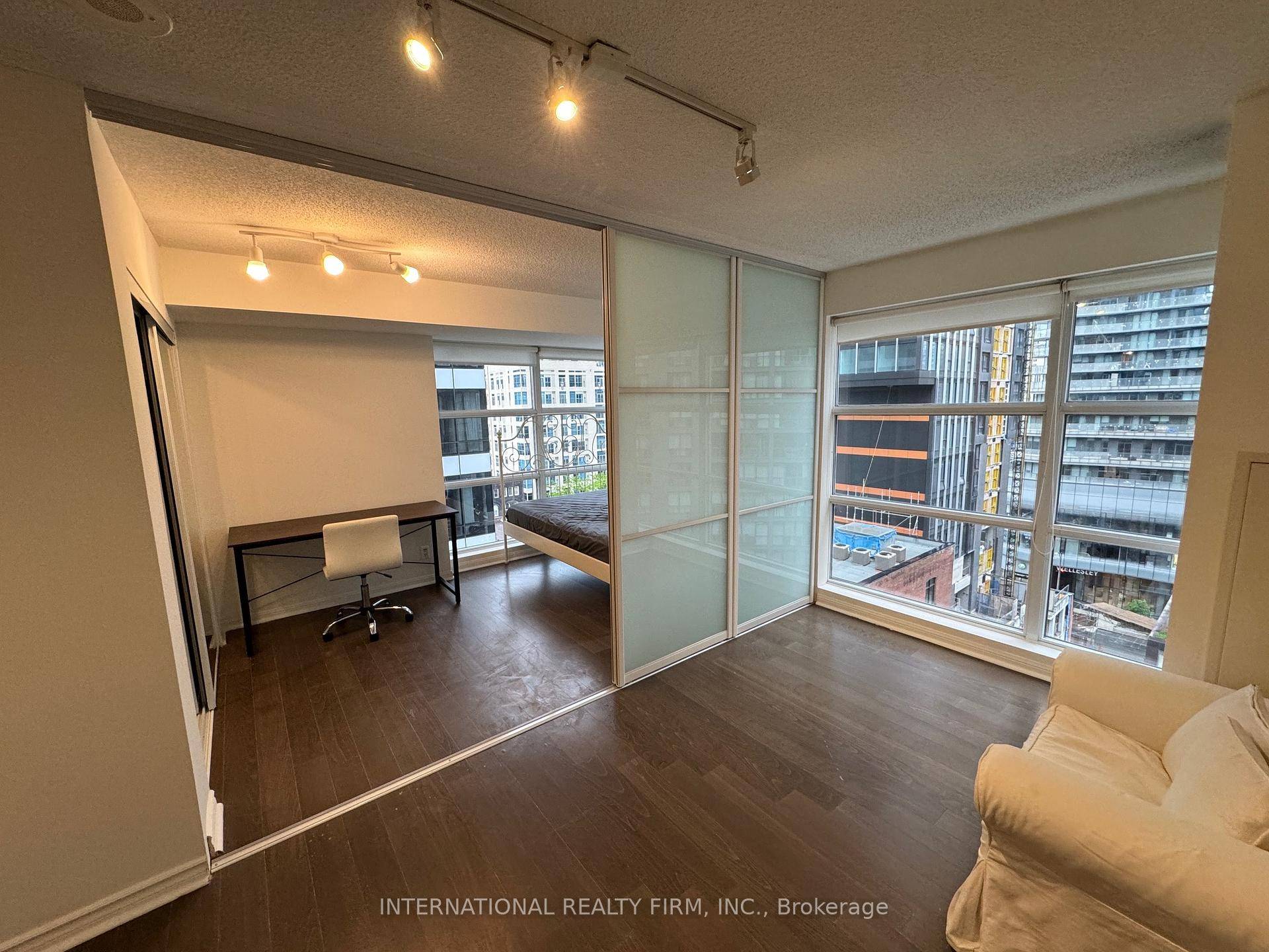 This recently renovated modern south facing corner home with a locker features an open layout and sleek glass sliding doors for more space options.