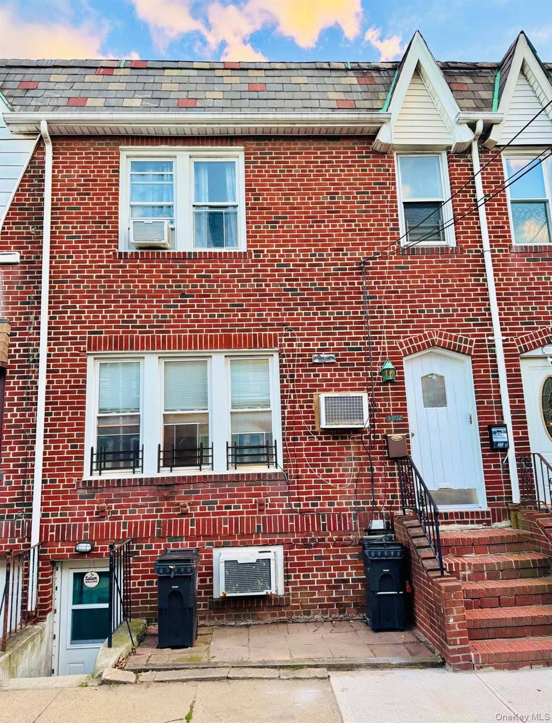 Welcome to 95 12 Woodhaven CT, Ozone Park a renovated 2 family brick house with 3 stories of living space.