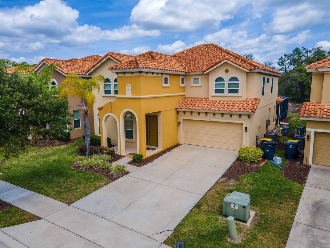 Welcome to 446 Orange Cosmos Drive in Davenport, located in the gated, amenity rich Watersong community.