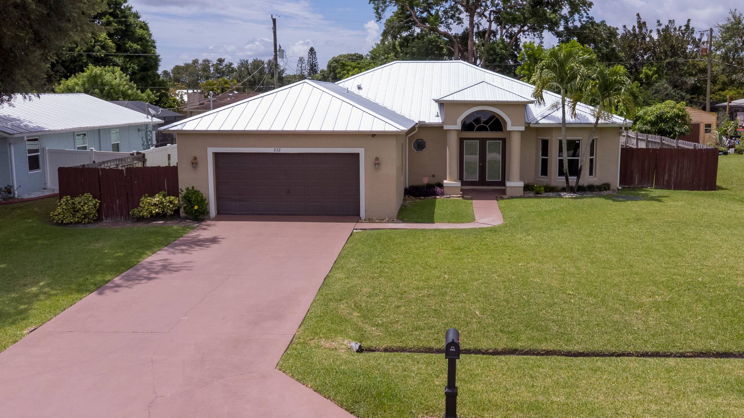This stunning home is nestled on a spacious lot in a prime location, offering the perfect blend of comfort and style.