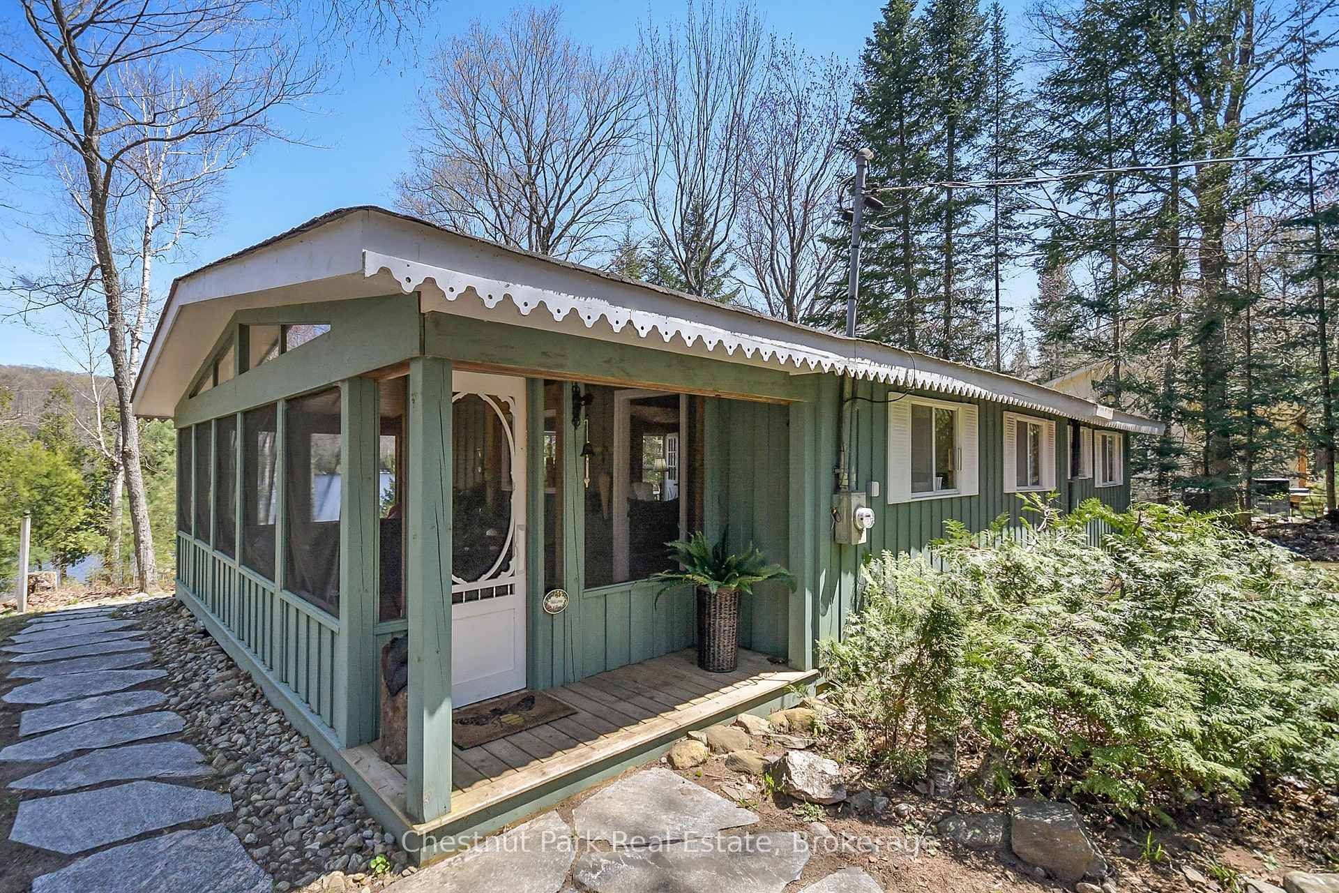 CLAM LAKE, three season cottage on year round paved municipal road.
