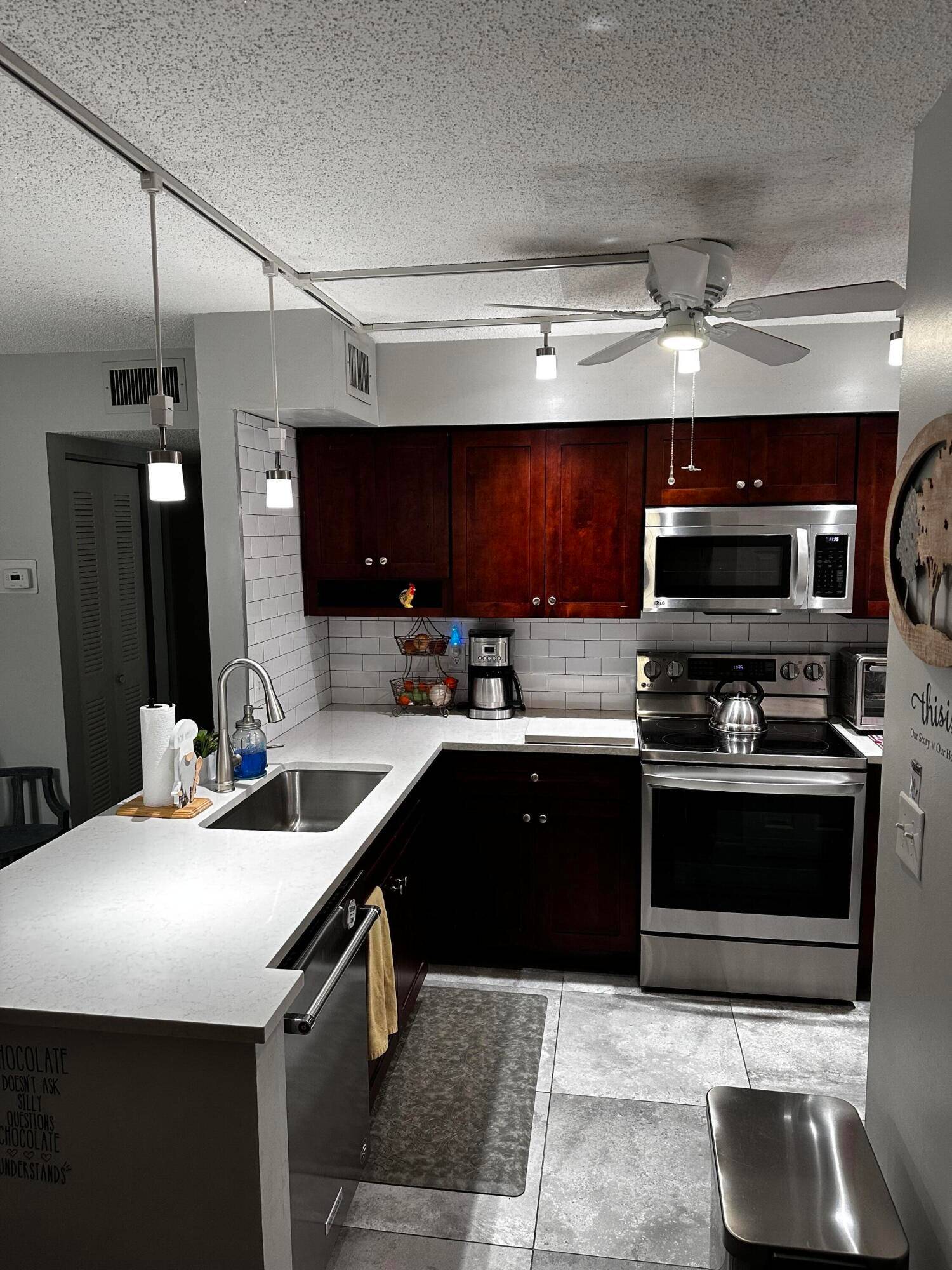 Move in ready, first floor corner unit.