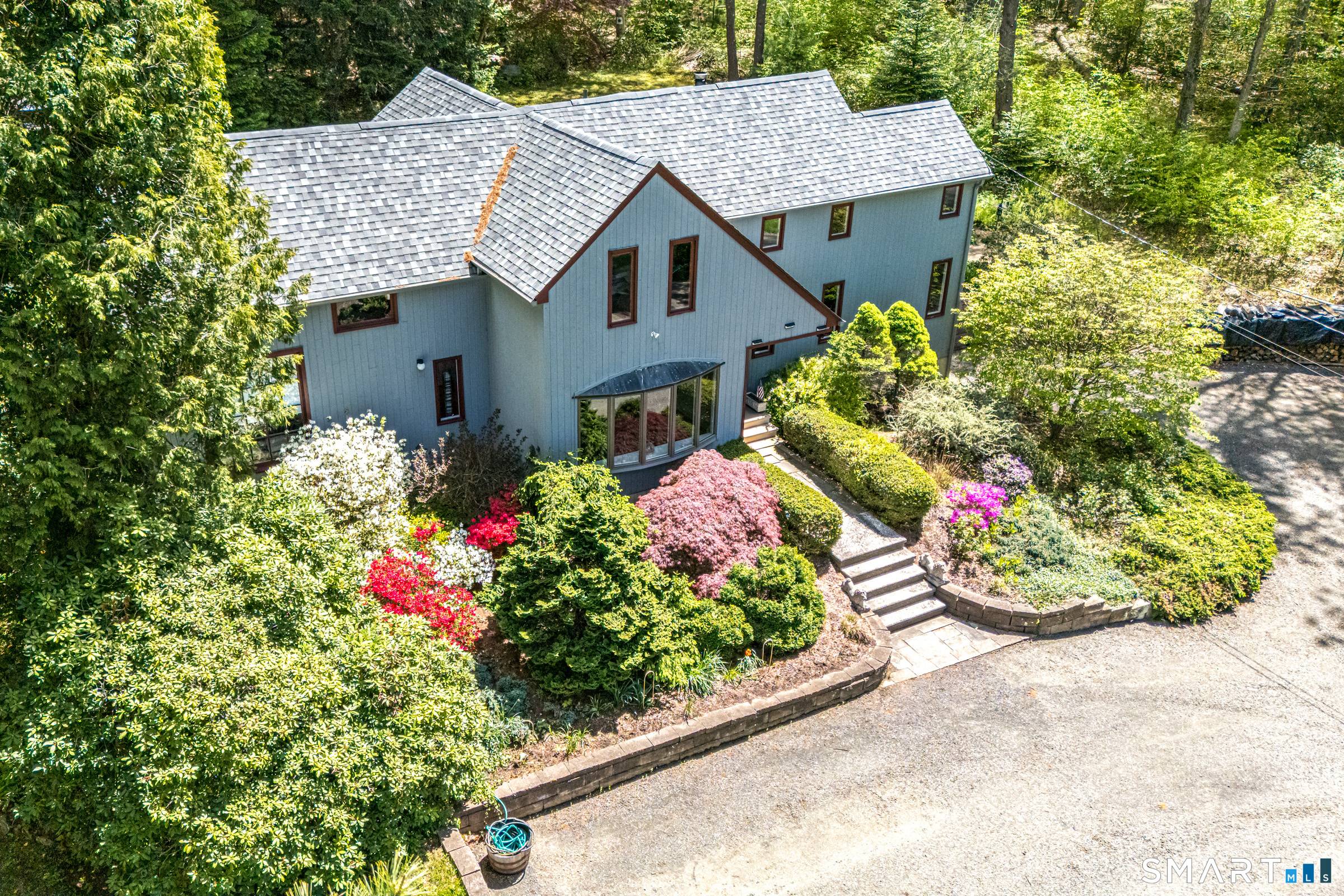Welcome to 128 Killingworth Road, Higganum Haddam a captivating contemporary country retreat where privacy meets spacious modern living.