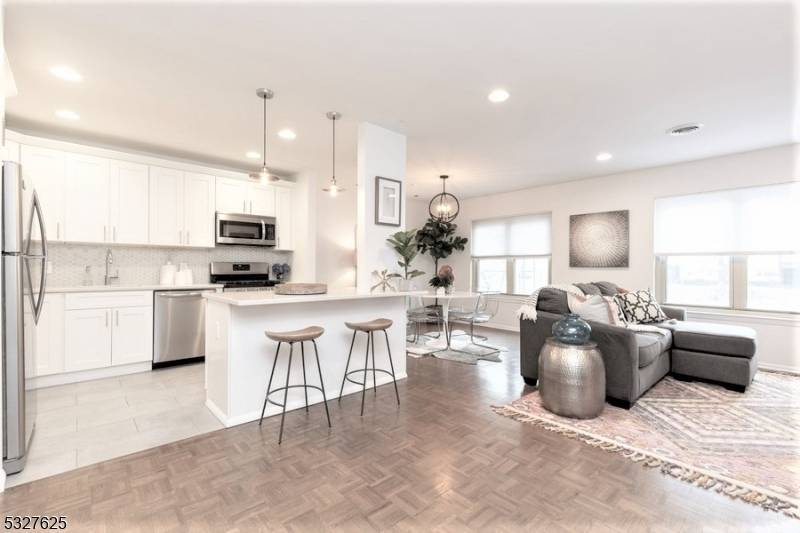 MOVE IN ready, amusing CONDO with HEAT hot cold WATER GAS INCLUDED free PARKING on property.