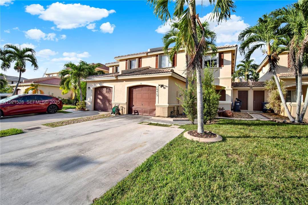 Stunning and beautifully updated townhouse in the highly desirable Lago Mar Villas community !