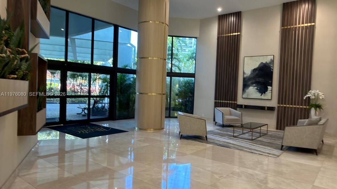 Stunning high floor residence in prestigious Mystic Pointe Tower 400 !