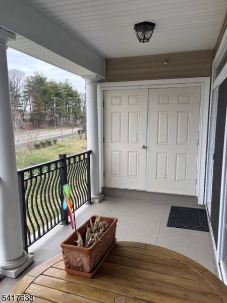 This open and airy end unit is move in ready.