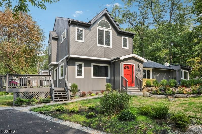 This fully renovated 4 5 BR home sits proudly on stunning property with multiple outdoor spaces for entertaining or quiet enjoyment.
