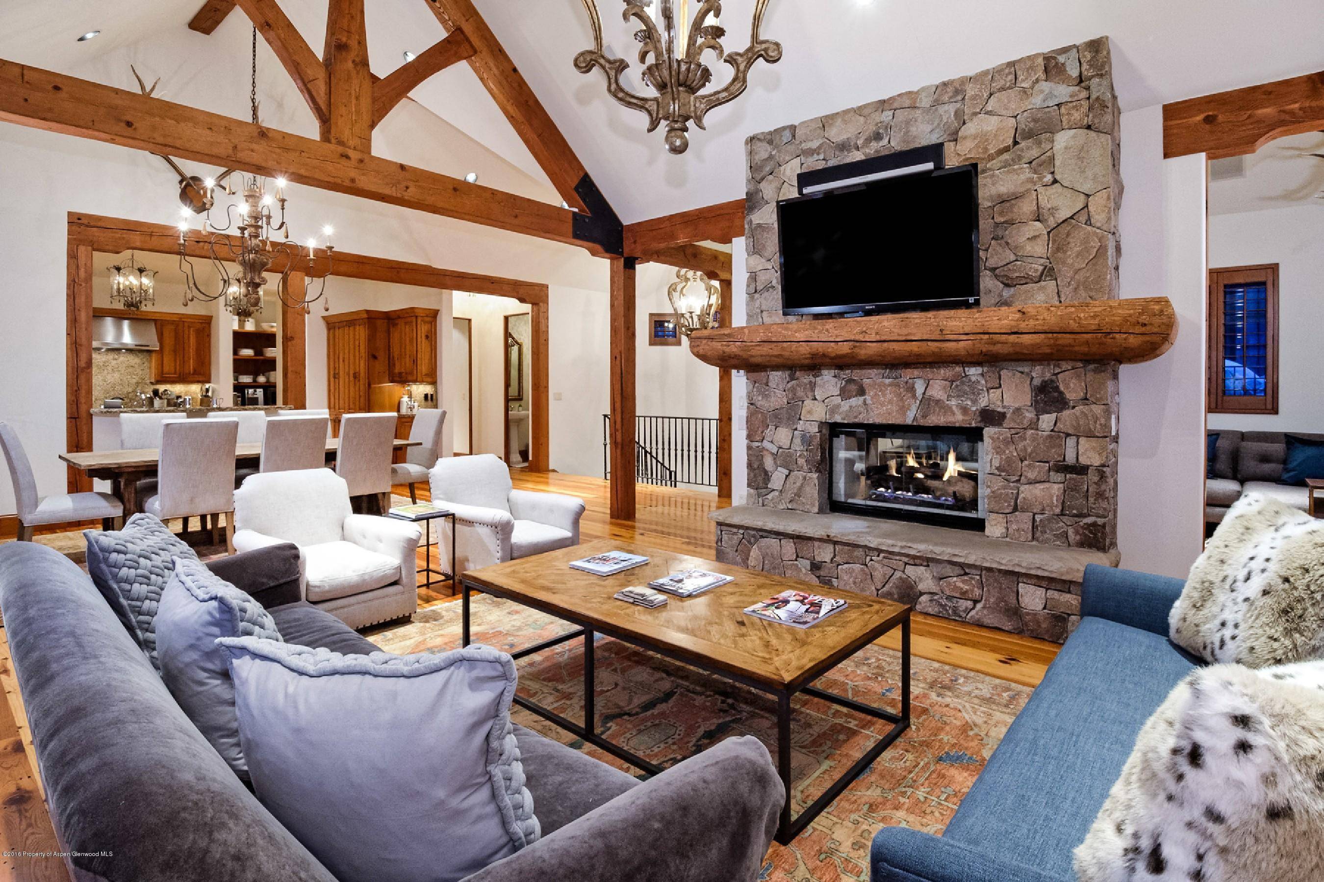 This warm and inviting mountain contemporary home offers tranquility and privacy in the quiet West End !