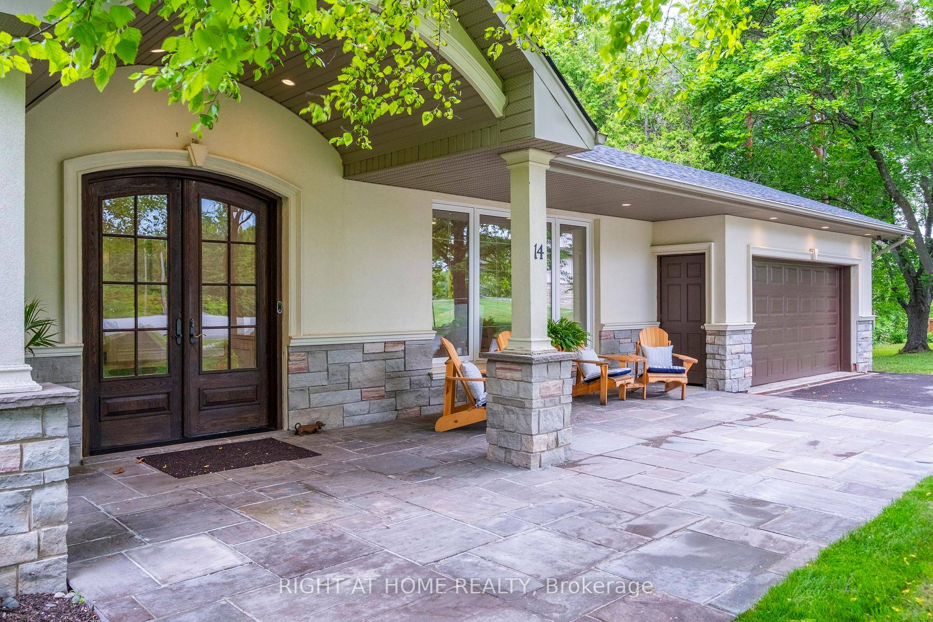 Discover the epitome of upscale, country living elegance in a sprawling 5, 300 sqft bungalow elegantly nestled on a private 2.