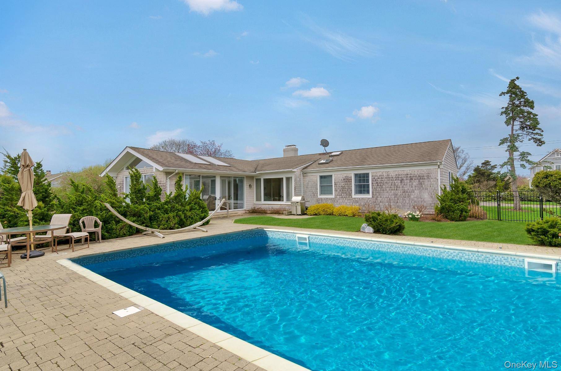 SOUTH OF HIGHWAY WESTHAMPTON BEACH UPDATED WITH GUNITE POOL.