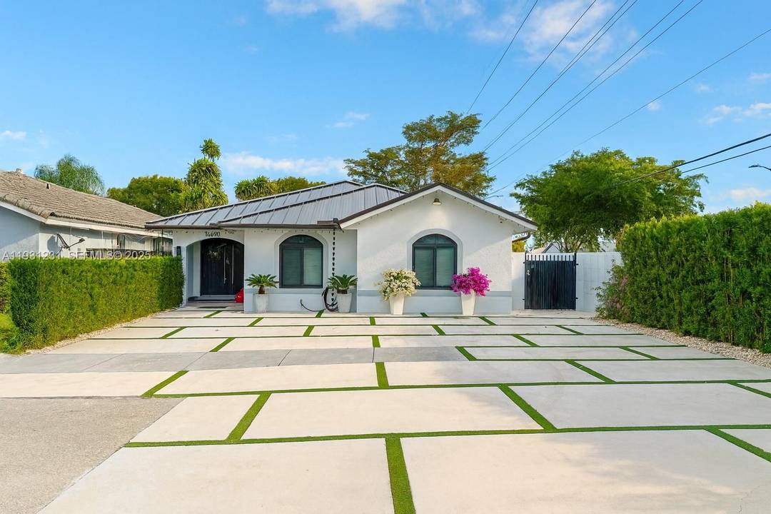 Beautifully maintained 3 bedroom, 2 bath residence offering a versatile office and multiple living spaces, including a living room, dining room, and family room.