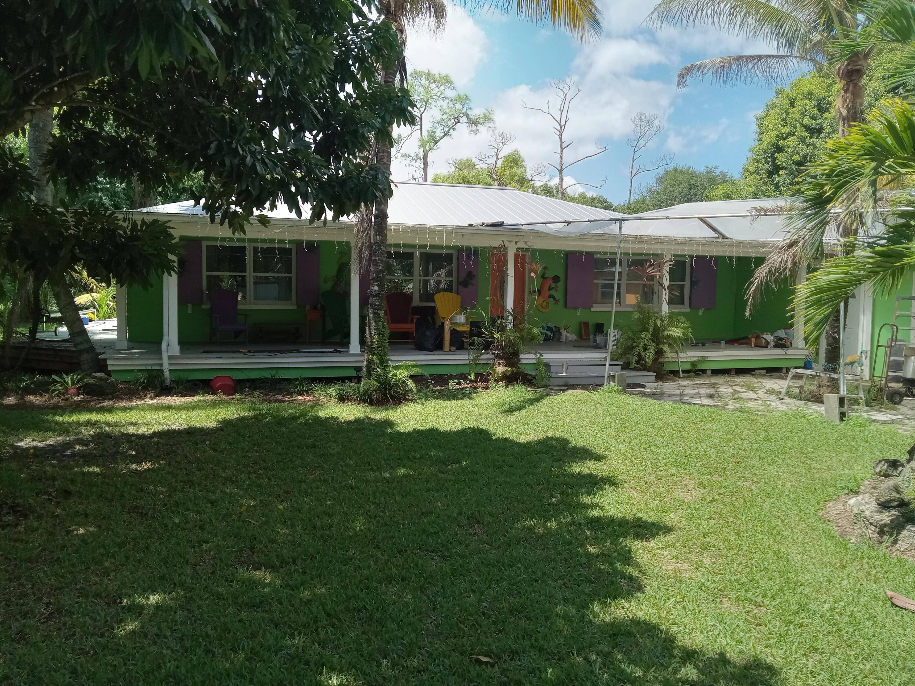 Estate Home on 4. 51 acres, 2 Acre Lake, 3 car garage, large Workshops, Steel Barn, Swimming POOL, Metal Roof, New Kitchen Bath, New SS Appliances, HUGE Front Porch, You ...
