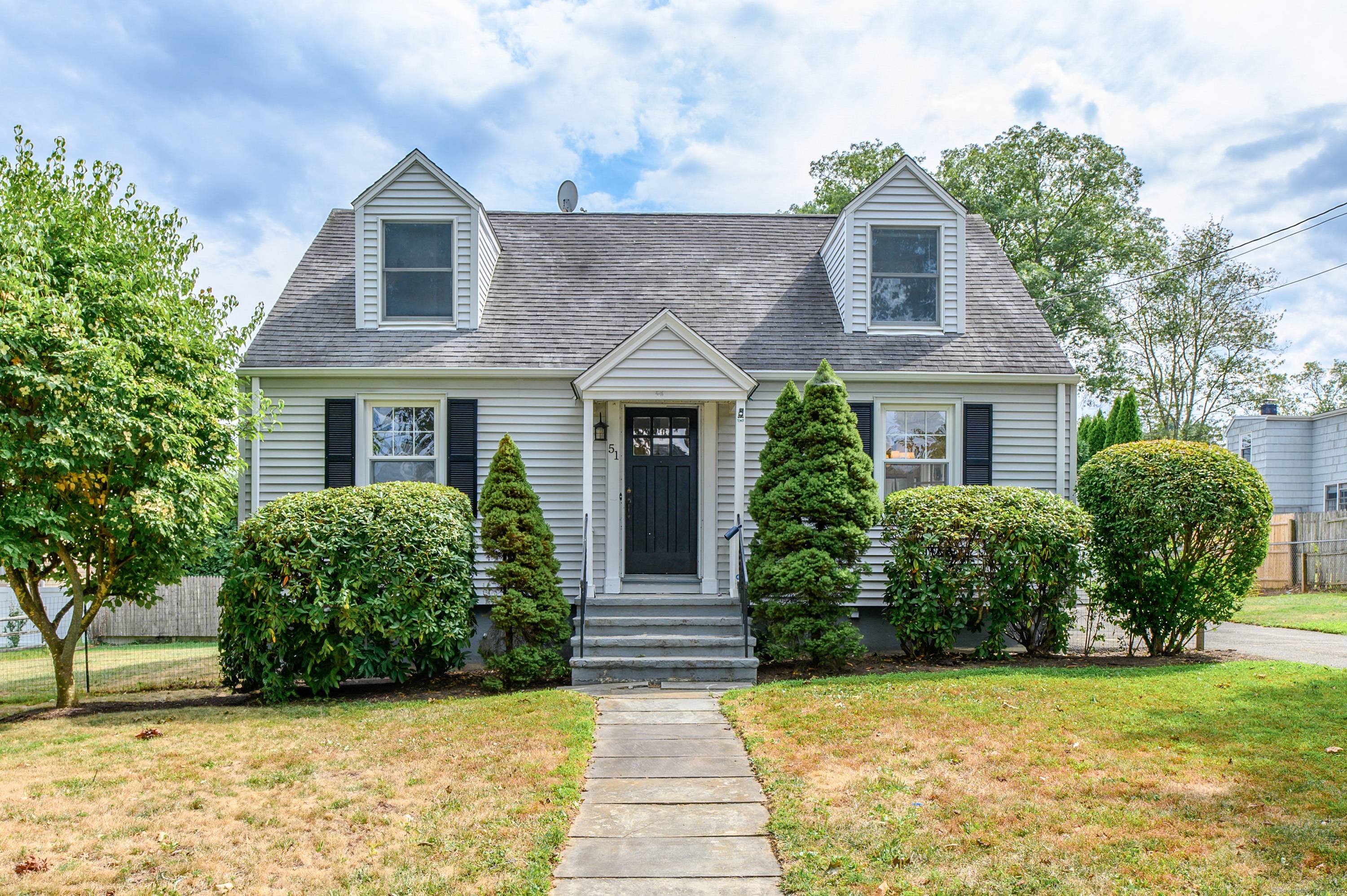 Beach area Rental. The level yard creates a welcoming outdoor environment, perfect for relaxation, gardening, or outdoor activities.