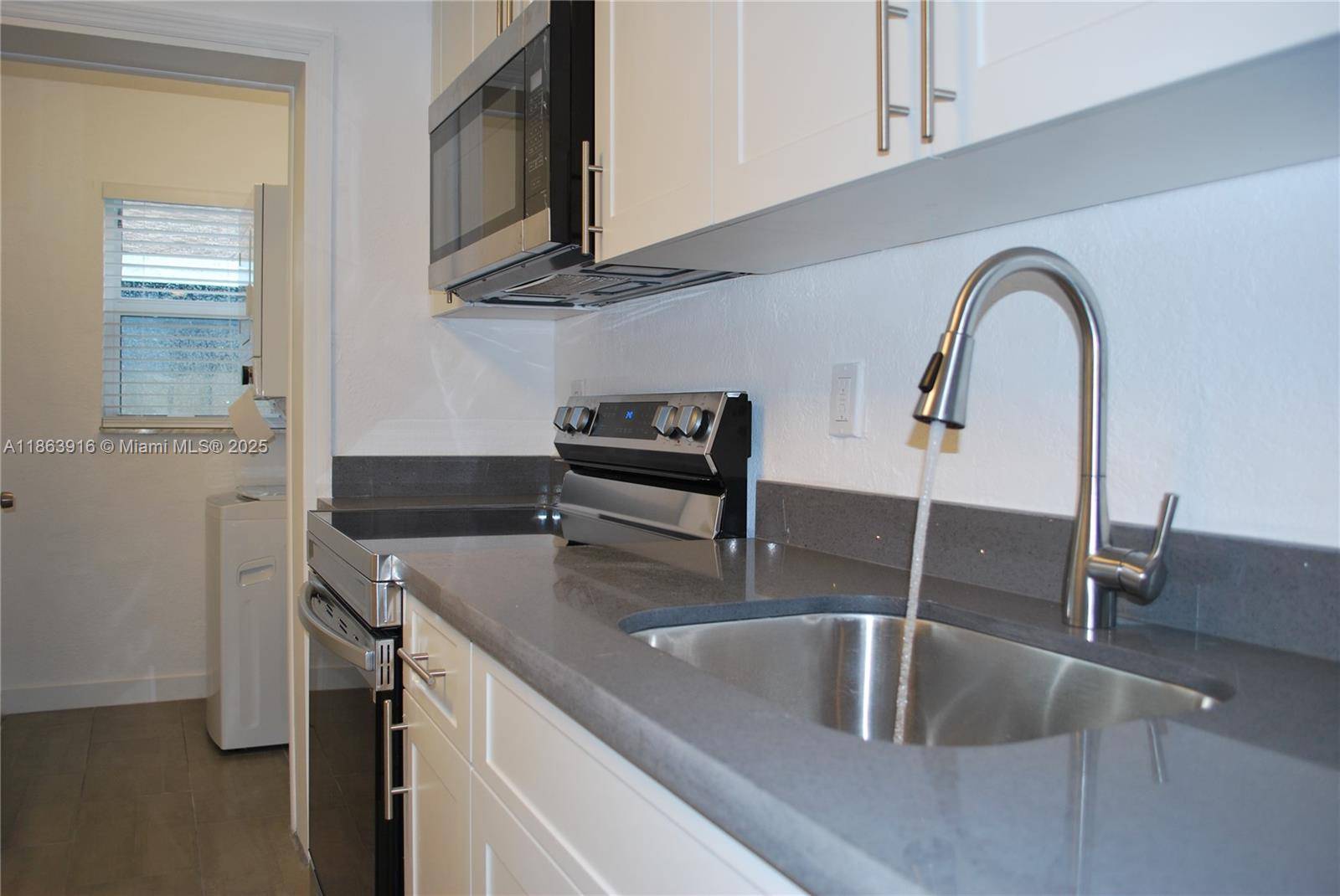 INVESTORS, ATTENTION ! ! I am glad to present to you this completely renovated income producer Triplex in the very active Oakland Park.