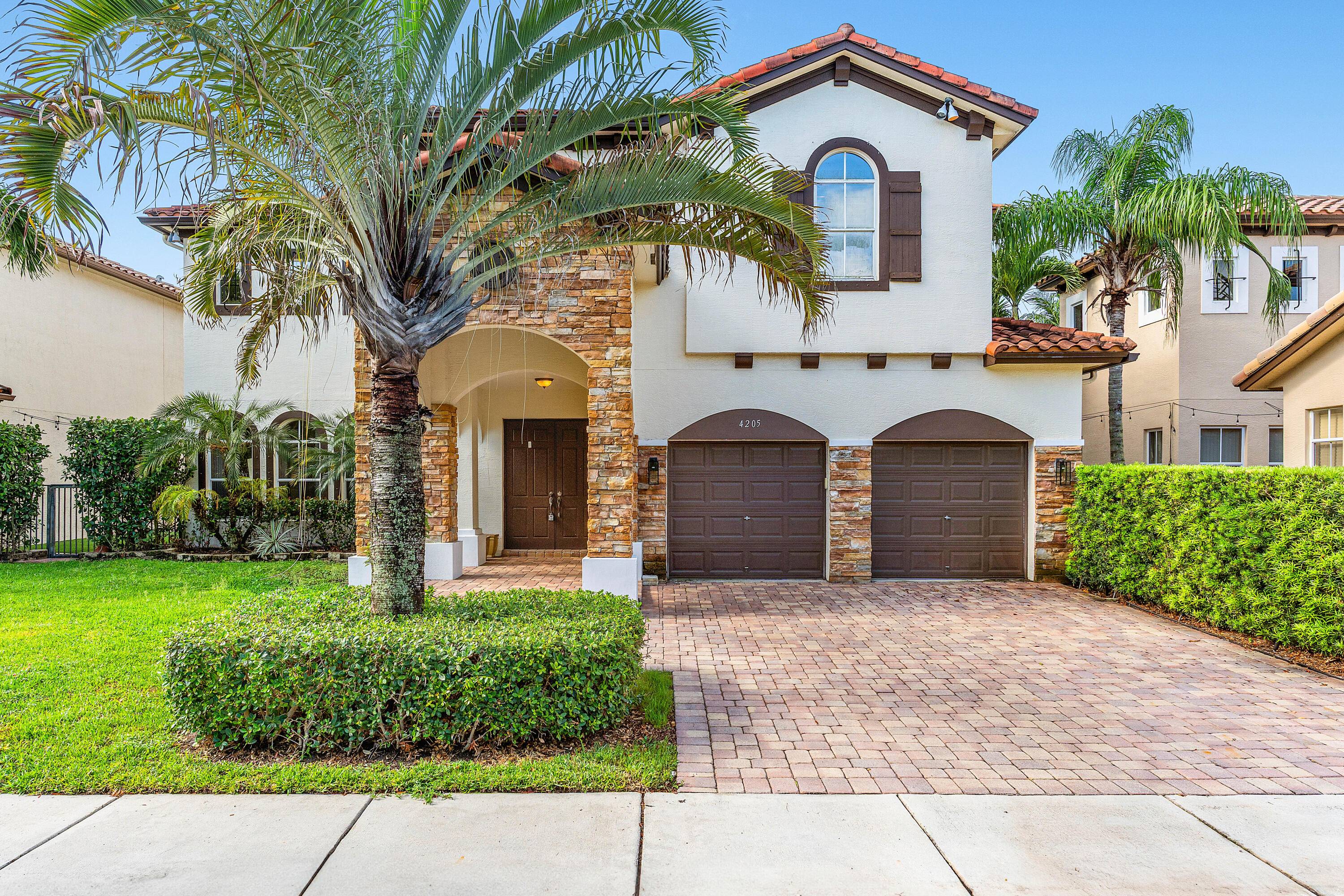 Welcome to your dream home in the highly sought after gated community of Artesa, centrally located in Boynton Beach.