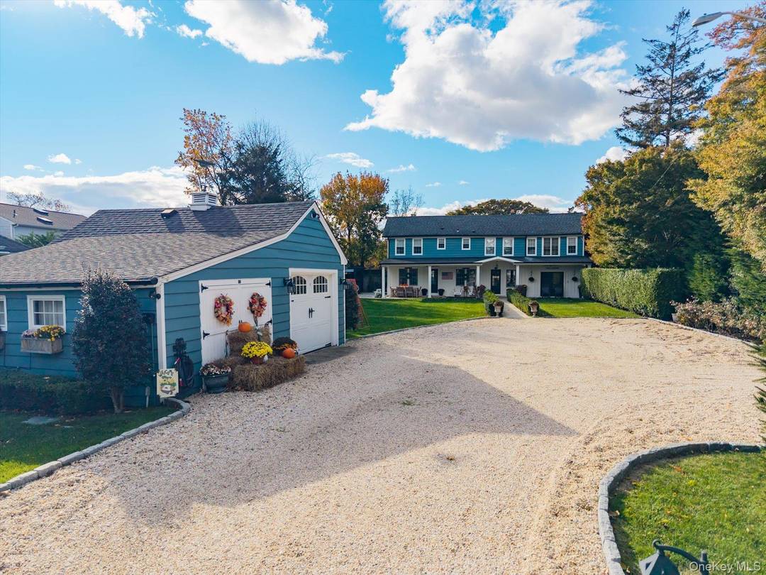 An exceptional opportunity to own a picture perfect 1852 Carriage House in the heart of historic Babylon Village.