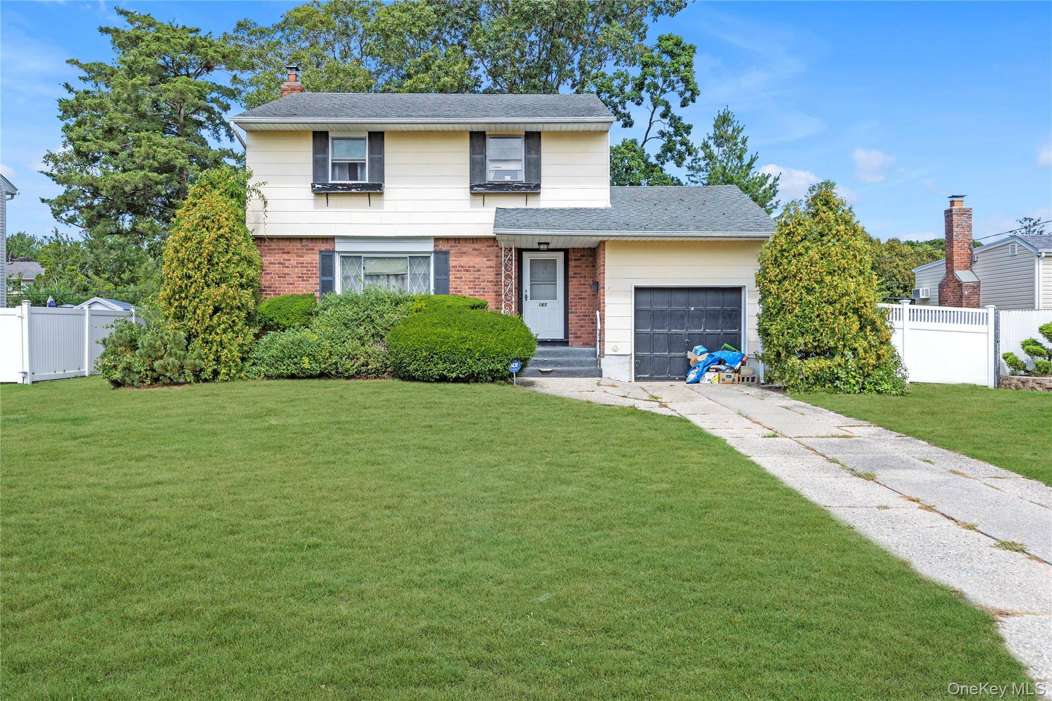 Welcome to your potential new Listing at 165 Country Village Lane, East Islip NY, 11730.